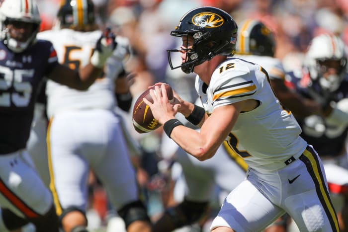 Missouri Tigers quarterback Brady Cook (12) scrambles during the game between the Missouri Tigers and the Auburn Tigers at Jordan-Hare Stadium on Sept. 24, 2022.